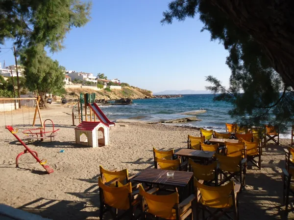 Relax by the sea and let your children play in the playground of the port of Souvala