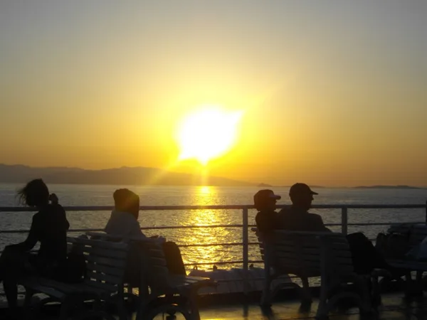 Enjoy the sunset while approaching Aigina Island, Greece